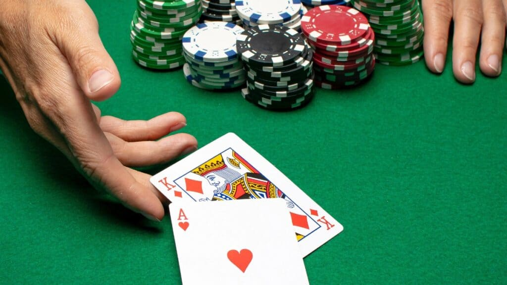 Poker table with chips and cards during a No Limit Hold'em hand