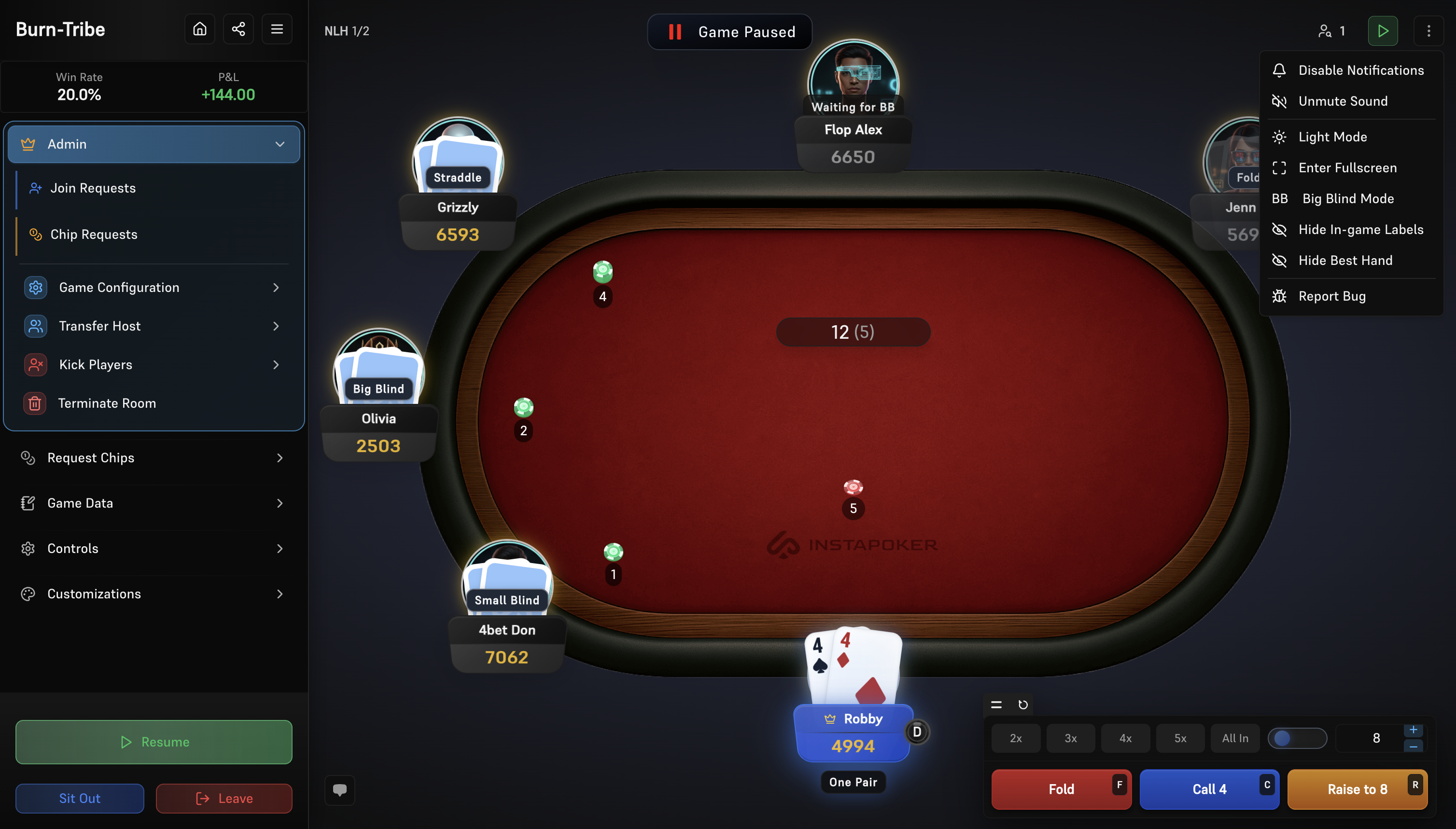 Poker table with community cards and chips in play